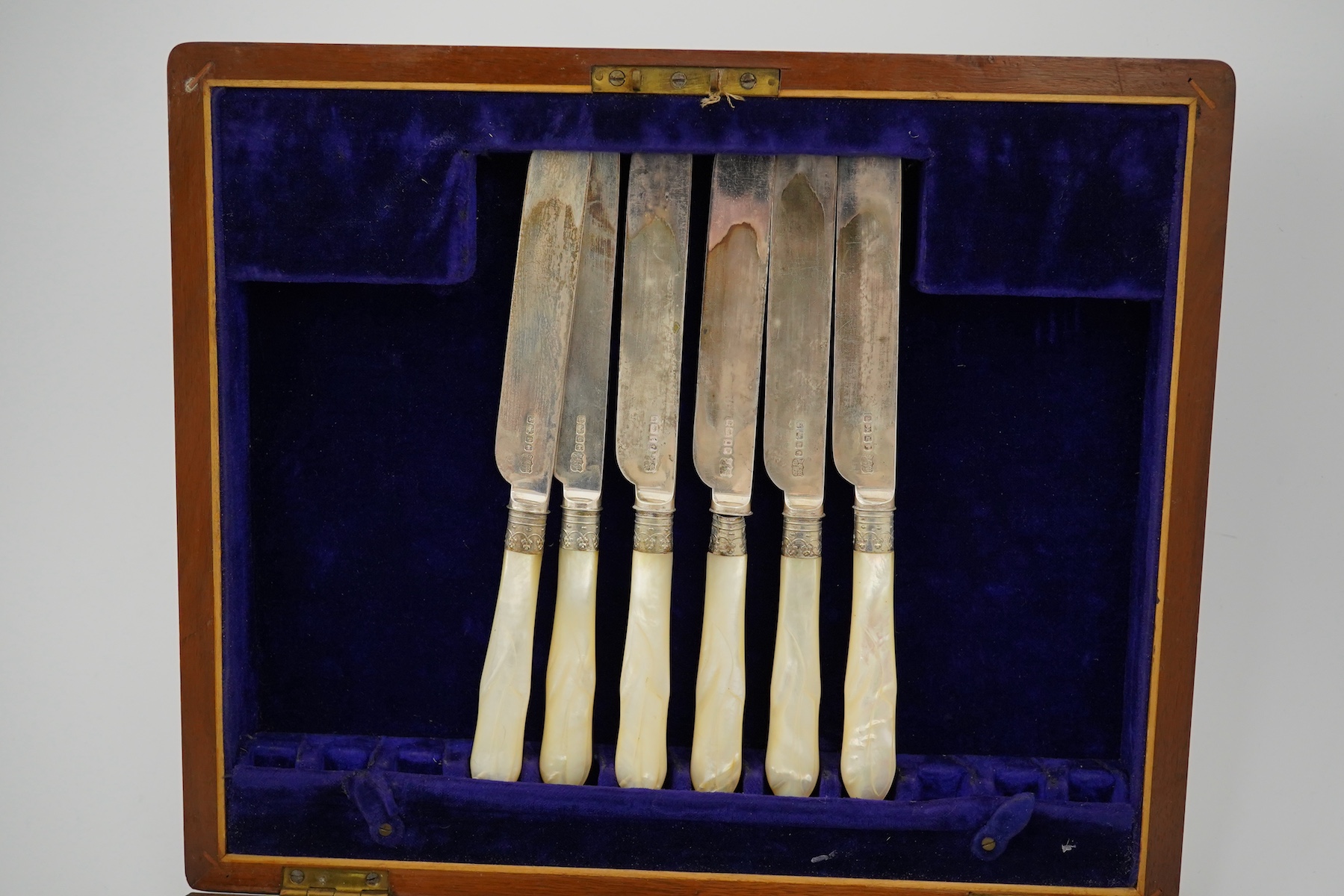 Twelve pairs of Victorian mother of pearl handled silver dessert eaters, by Mappin & Webb